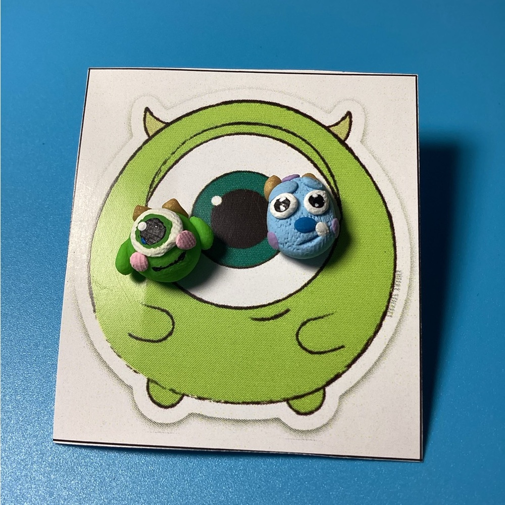 Monster-Inspired Green and Blue Earrings